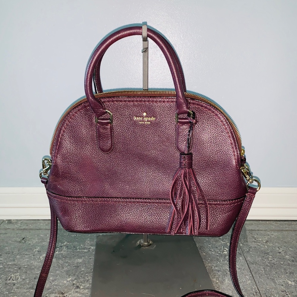 Kate Spade plum purse with Tassel